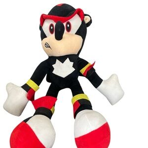 Plush Toy with Red and Black Accents